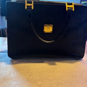 MCM Black Satchel with Gold Accents